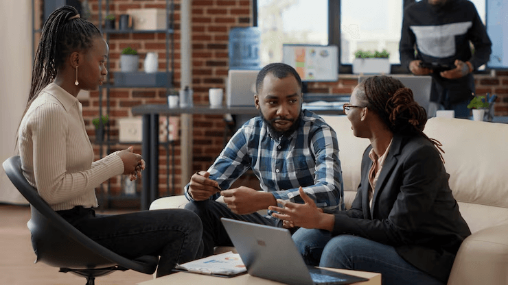 Two people discussing work